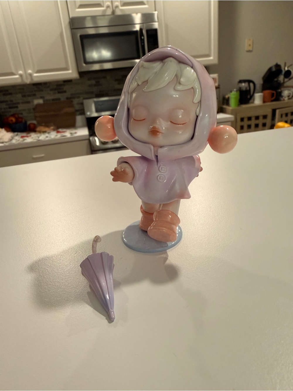 PopMart Skull Panda Warmth Series:Pastel Raincoat Figurine in Lavender and Peach